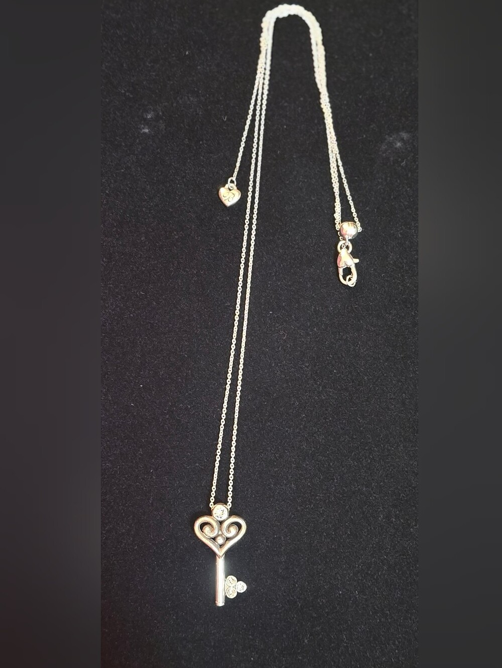 Brighton scroll filigree heart key necklace.